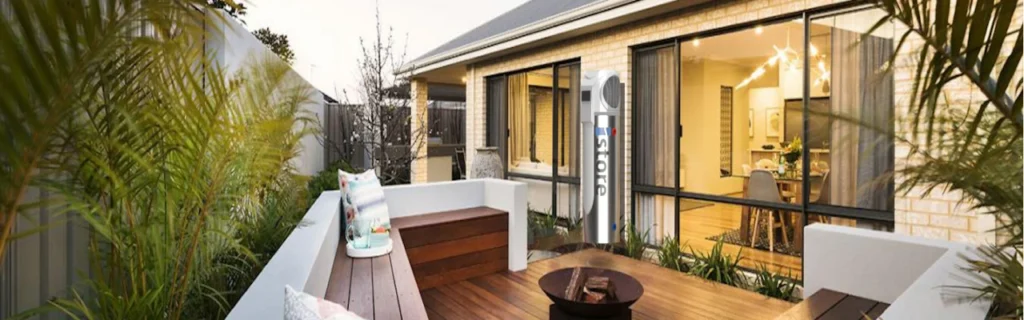 Image from a nice homes alfresco area showing an iStore hot water heater installed against a brick wall